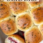 Turkey sliders in a casserole dish with one turned on its side with text overlay.