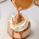 A mini Biscoff cheesecake with warmed Biscoff spread being poured on with text overlay.