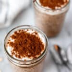 Two jars of tiramisu overnight oats topped with yogurt and cocoa powder with text overlay.