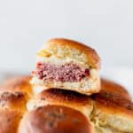 A corned beef slider sitting on top of more sliders.