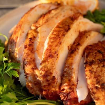 Close up of slices of a smoked turkey breast.