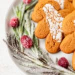 Close up of sugared cranberries and sugared rosemary.